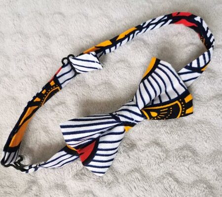 Nœud papillon enfant – wax fleurs de mariage – rouge et jaune Nœud papillon enfant – wax fleurs de mariage – rouge et jaune